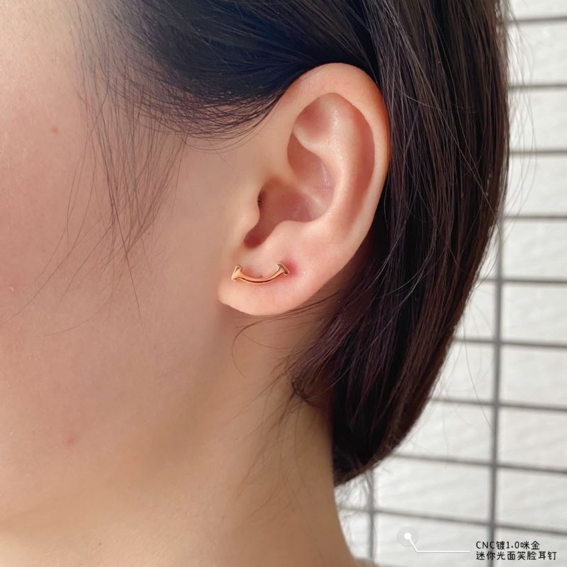 T*f*ny earrings
